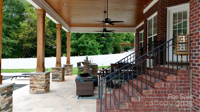 3005 Monterrey Ln, Monroe, NC 28110 - fenced backyard with a patio area and ceiling fan
