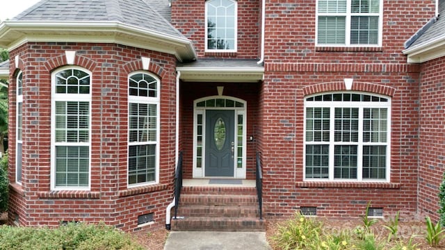 3005 Monterrey Ln, Monroe, NC 28110 - doorway to property with crawl space, brick siding, and roof with shingles