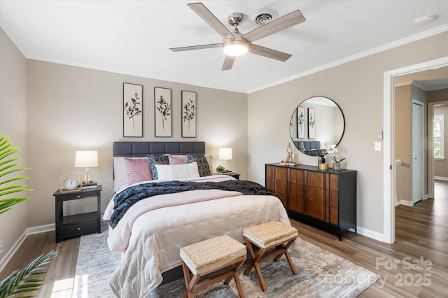 1409 Kensington Rd Unit B-8, Hendersonville, NC 28791 - bedroom with wood finished floors, ornamental molding, and ceiling fan