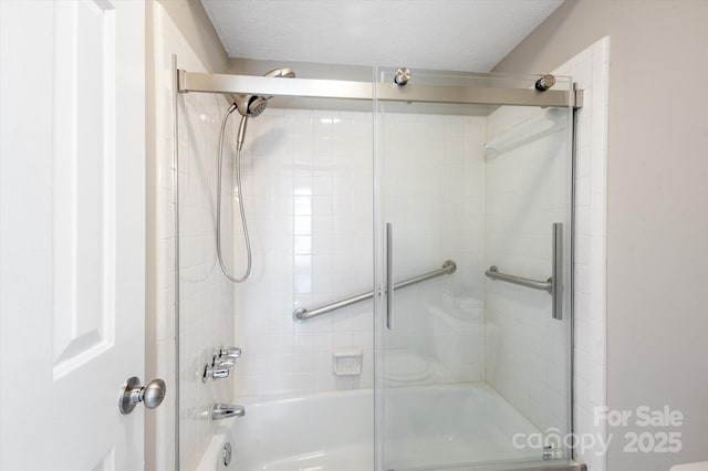 1409 Kensington Rd Unit B-8, Hendersonville, NC 28791 - full bathroom with combined bath / shower with glass door and a textured ceiling