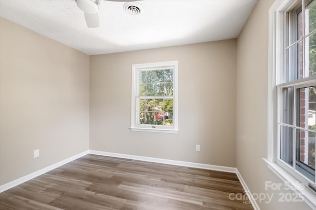 1409 Kensington Rd Unit B-8, Hendersonville, NC 28791 - empty room featuring wood finished floors and a ceiling fan