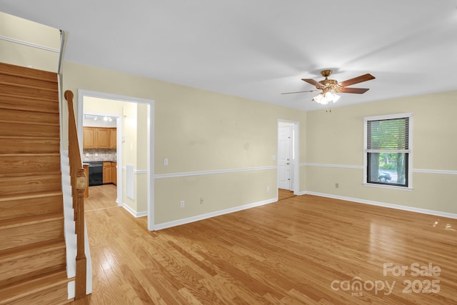 106 Birmingham Pl, Salisbury, NC 28146 - empty room with ceiling fan, stairway, and light wood-type flooring