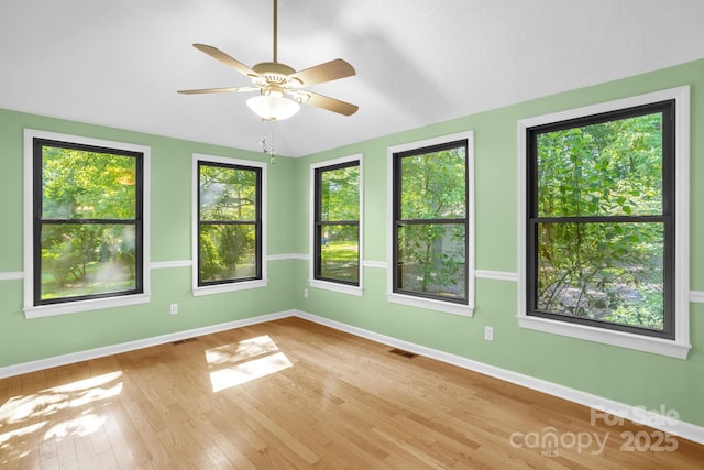 106 Birmingham Pl, Salisbury, NC 28146 - unfurnished room with wood finished floors, a ceiling fan, and lofted ceiling