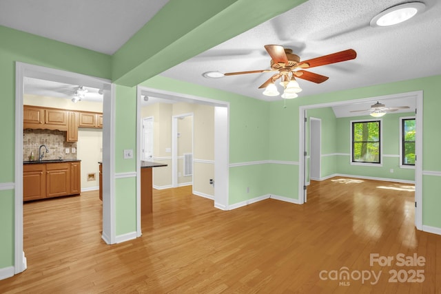 106 Birmingham Pl, Salisbury, NC 28146 - empty room with a ceiling fan and light wood finished floors