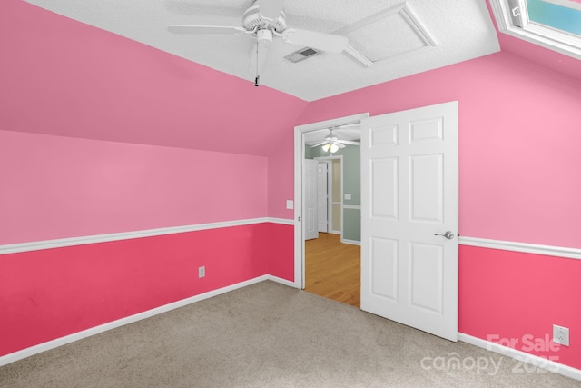 106 Birmingham Pl, Salisbury, NC 28146 - unfurnished bedroom with lofted ceiling, a ceiling fan, carpet floors, and a textured ceiling
