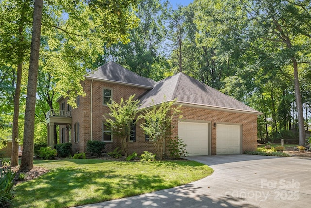 106 Birmingham Pl, Salisbury, NC 28146 - view of front of property with driveway, a garage, brick siding, a front lawn, and roof with shingles