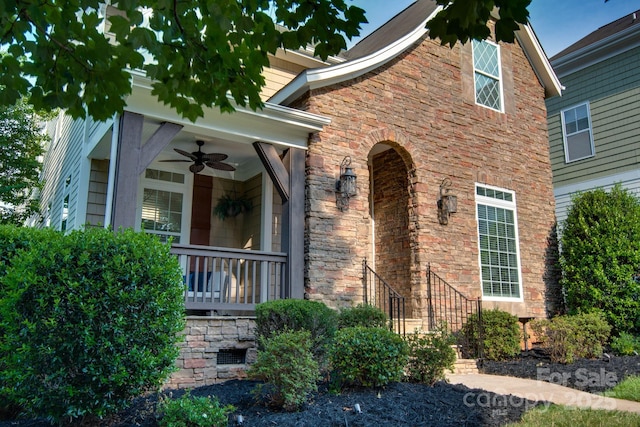 812 Cedar St, Mcadenville, NC 28101 - view of front of property featuring ceiling fan, stone siding, and a porch