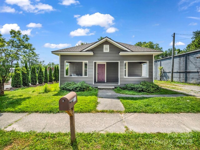 118 Railroad Ave, Brevard, NC 28712 - view of front of home featuring a porch and roof with shingles