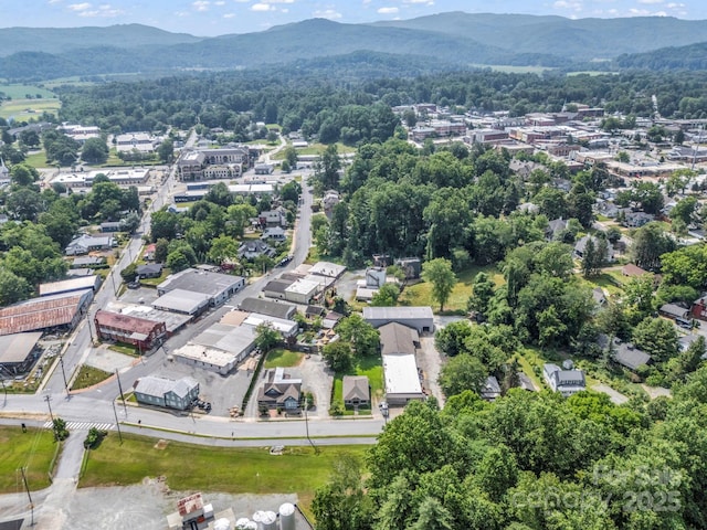 118 Railroad Ave, Brevard, NC 28712 - aerial overview of property's location featuring a mountainous background and nearby suburban area