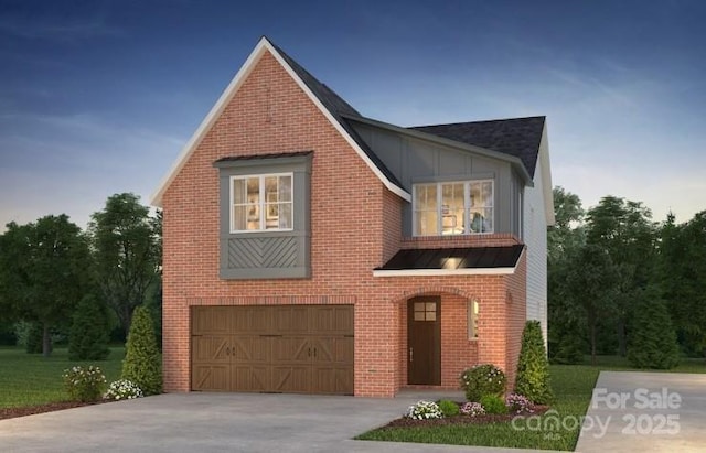 920 Coast Dr, Tega Cay, SC 29708 - view of front of house featuring concrete driveway, an attached garage, and brick siding