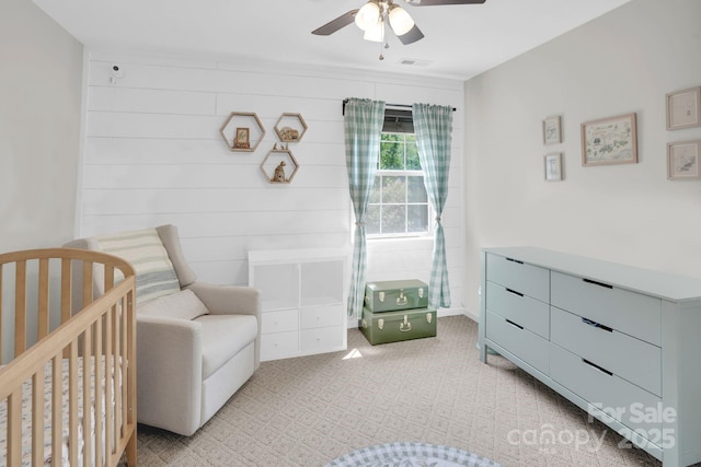 5901 Creft Cir, Indian Trail, NC 28079 - bedroom with light carpet, a nursery area, and a ceiling fan