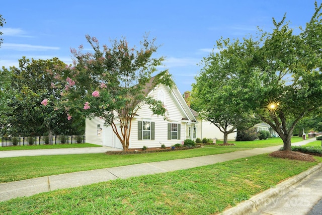 5901 Creft Cir, Indian Trail, NC 28079 - view of property hidden behind natural elements featuring a front yard, driveway, and a garage