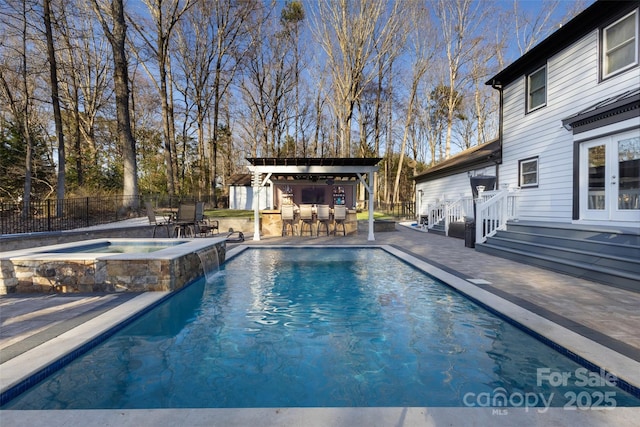 10700 Chestnut Hill Dr, Matthews, NC 28105 - view of pool with a pool with connected hot tub, an outdoor structure, and a patio area