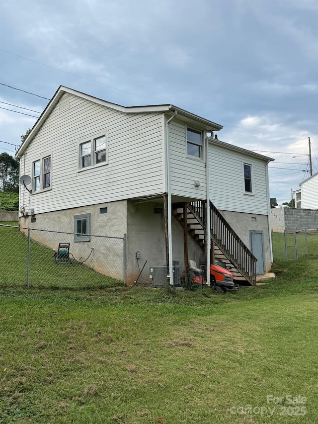 1045 Warren Pl NW, Lenoir, NC 28645 - rear view of property featuring stairway