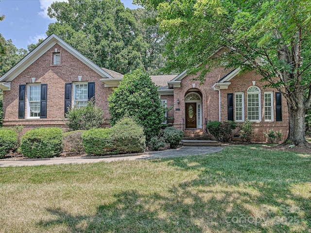 10638 Moss Mill Ln, Charlotte, NC 28277 - traditional home with brick siding and a front lawn