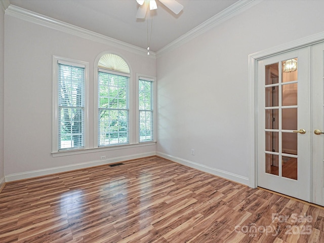 10638 Moss Mill Ln, Charlotte, NC 28277 - unfurnished room featuring ornamental molding, healthy amount of natural light, wood finished floors, and ceiling fan