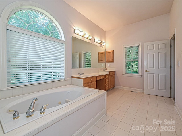 10638 Moss Mill Ln, Charlotte, NC 28277 - bathroom with healthy amount of natural light, tile patterned flooring, double vanity, and a whirlpool tub