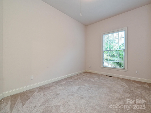 10638 Moss Mill Ln, Charlotte, NC 28277 - carpeted empty room featuring baseboards and lofted ceiling