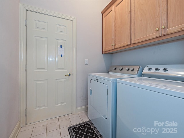 10638 Moss Mill Ln, Charlotte, NC 28277 - washroom featuring cabinet space, light tile patterned floors, and washing machine and dryer