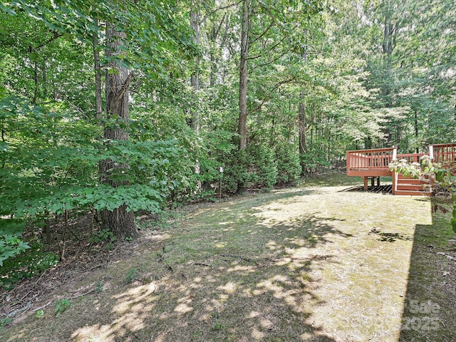 10638 Moss Mill Ln, Charlotte, NC 28277 - view of yard featuring a wooden deck and a forest view