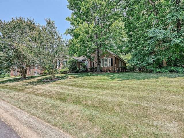 10638 Moss Mill Ln, Charlotte, NC 28277 - view of front of house featuring a front yard and brick siding