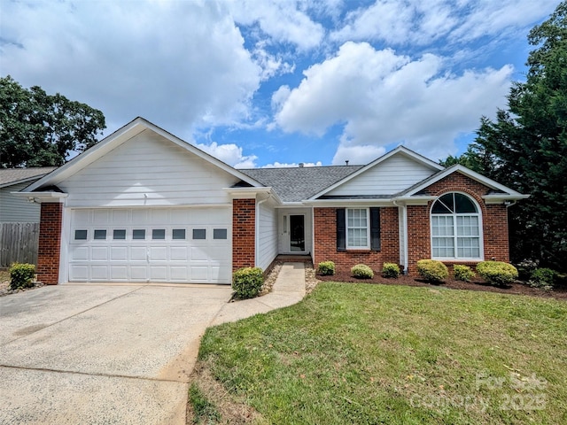 4002 Beaverbrook Dr, Indian Trail, NC 28079 - single story home with brick siding, concrete driveway, a garage, and roof with shingles