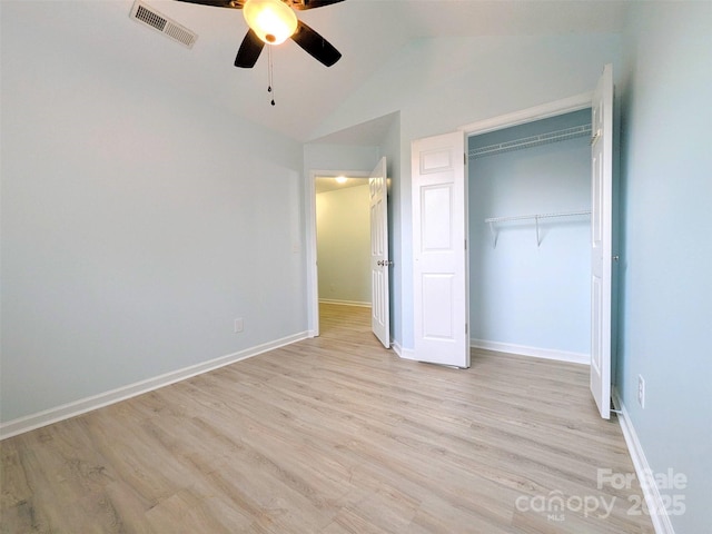 4002 Beaverbrook Dr, Indian Trail, NC 28079 - unfurnished bedroom with lofted ceiling, light wood finished floors, a closet, and ceiling fan