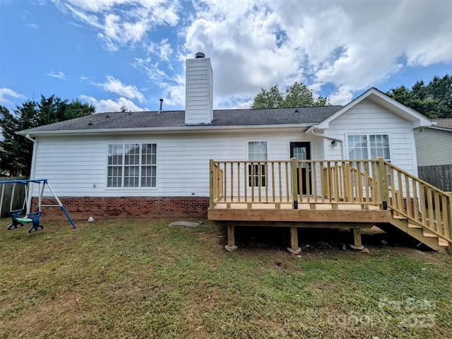 4002 Beaverbrook Dr, Indian Trail, NC 28079 - rear view of property with a chimney, a lawn, and a wooden deck