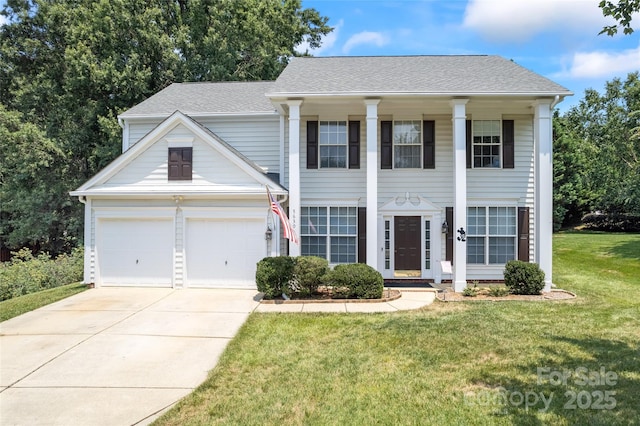 5630 Cambridge Bay Dr, Charlotte, NC 28269 - neoclassical / greek revival house featuring driveway, a front yard, and roof with shingles