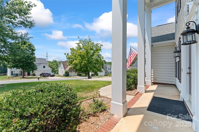 5630 Cambridge Bay Dr, Charlotte, NC 28269 - view of yard with covered porch and a residential view