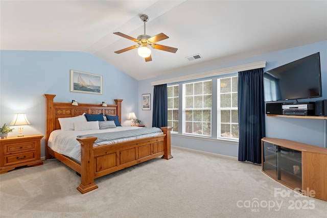5630 Cambridge Bay Dr, Charlotte, NC 28269 - bedroom featuring vaulted ceiling, light colored carpet, and ceiling fan