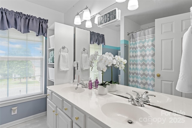 5630 Cambridge Bay Dr, Charlotte, NC 28269 - full bathroom with double vanity and a shower with curtain