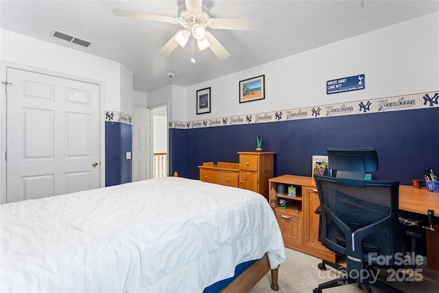 5630 Cambridge Bay Dr, Charlotte, NC 28269 - bedroom with light colored carpet, a desk, and a ceiling fan