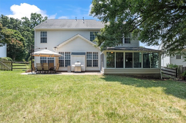 5630 Cambridge Bay Dr, Charlotte, NC 28269 - back of property with a patio and a sunroom