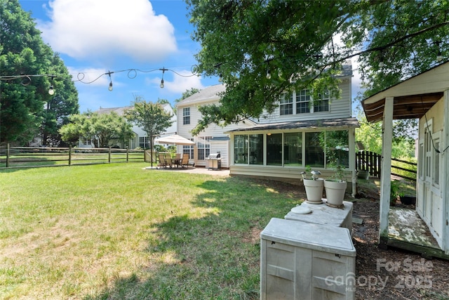 5630 Cambridge Bay Dr, Charlotte, NC 28269 - fenced backyard with a patio area and a sunroom