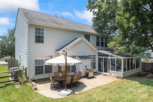 5630 Cambridge Bay Dr, Charlotte, NC 28269 - back of house with a sunroom, a patio area, and roof with shingles