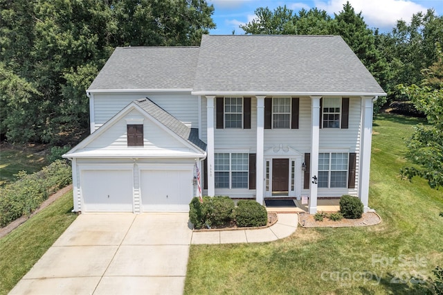 5630 Cambridge Bay Dr, Charlotte, NC 28269 - greek revival inspired property featuring driveway, a garage, a front lawn, a porch, and roof with shingles