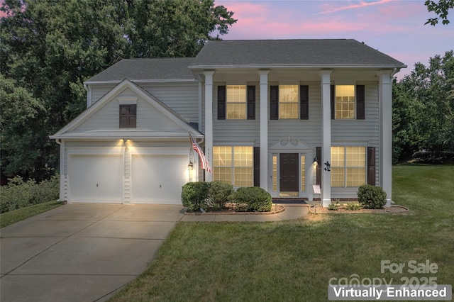 5630 Cambridge Bay Dr, Charlotte, NC 28269 - greek revival inspired property featuring concrete driveway, a lawn, and roof with shingles