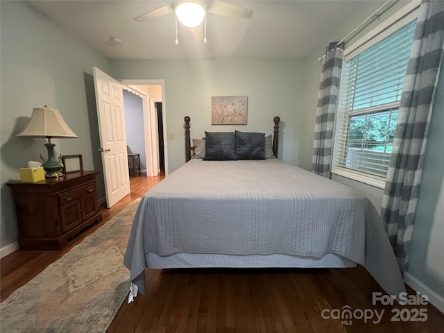 130 Sherwood Dr, Lake Lure, NC 28746 - bedroom featuring wood finished floors and a ceiling fan