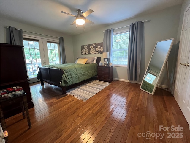 130 Sherwood Dr, Lake Lure, NC 28746 - bedroom with hardwood / wood-style flooring, access to exterior, french doors, and multiple windows