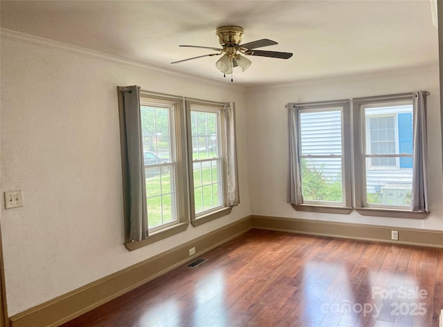 729 Elm St, Salisbury, NC 28144 - unfurnished room featuring a ceiling fan, wood finished floors, and crown molding