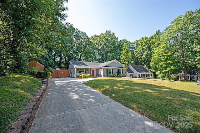 7627 Walnut Wood Dr, Charlotte, NC 28227 - ranch-style home featuring driveway and a gate
