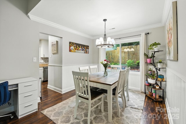 7627 Walnut Wood Dr, Charlotte, NC 28227 - dining space featuring a chandelier, dark wood-style floors, wainscoting, ornamental molding, and a desk