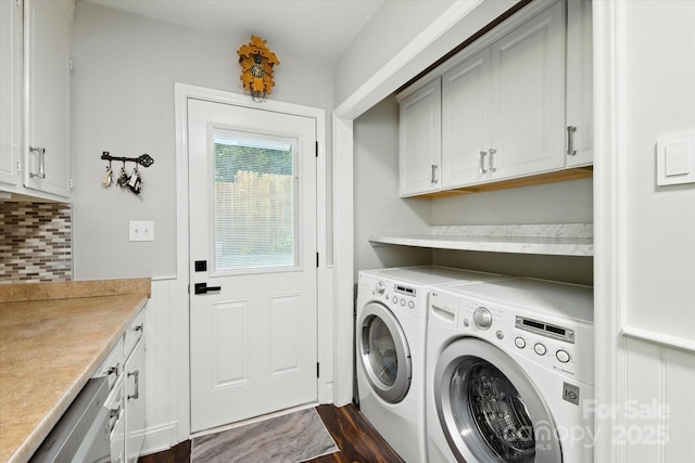 7627 Walnut Wood Dr, Charlotte, NC 28227 - laundry area featuring cabinet space, washer and clothes dryer, and dark wood-style flooring