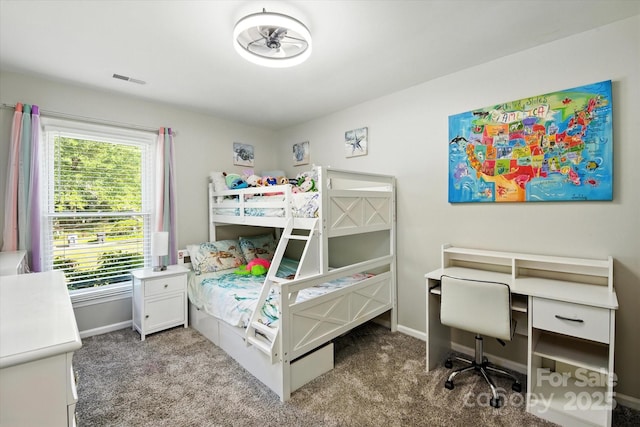 7627 Walnut Wood Dr, Charlotte, NC 28227 - bedroom with multiple windows, carpet, and an office area
