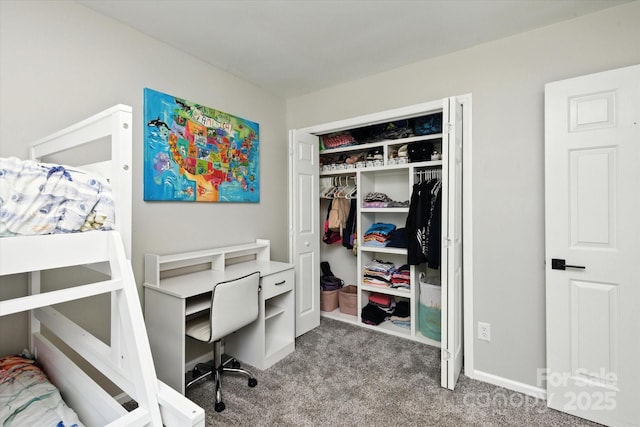 7627 Walnut Wood Dr, Charlotte, NC 28227 - carpeted bedroom featuring a closet and baseboards