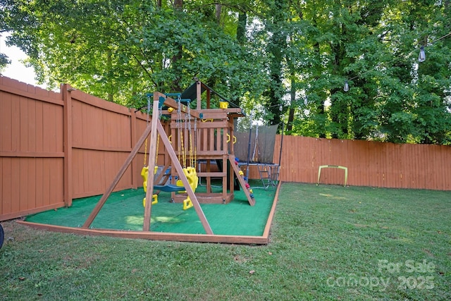 7627 Walnut Wood Dr, Charlotte, NC 28227 - view of play area featuring a trampoline and a fenced backyard