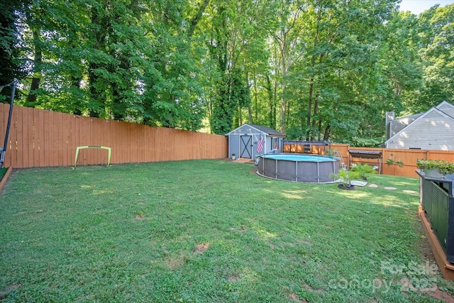 7627 Walnut Wood Dr, Charlotte, NC 28227 - fenced backyard with a shed