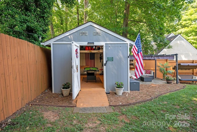 7627 Walnut Wood Dr, Charlotte, NC 28227 - view of shed featuring a fenced backyard