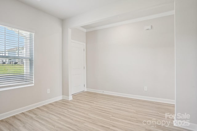 1997 Paddlewheel Dr, Stanley, NC 28164 - empty room featuring light wood finished floors and crown molding